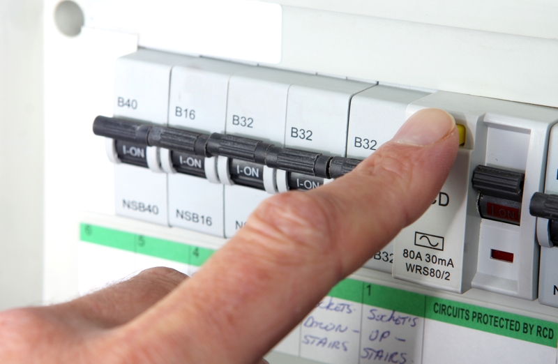 Testing an RCD (Residual Current Device) on a UK domestic electrical consumer unit or fuse box Residual Current Device